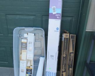 Lot 442. Two 3' lights and a box of 48" T8 bulbs, plus blinds and a rolling tote
