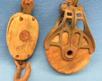 Lot 44. Two antique wooden pulleys