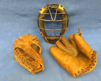 Lot 365. Vintage baseball gloves, one is marked USMC, and a catchers mask