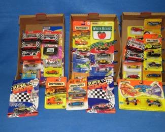 Lot 230. Over 30 new-in-the-package Matchbox cars