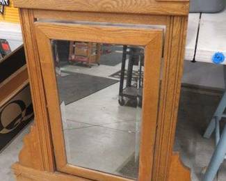 Lot 464. Swivel mirror from a dresser. The mirror and frame that swivels is 18" X 28". The widest part of the mirror is