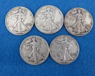 Lot 167. Five Walking Liberty silver half-dollars