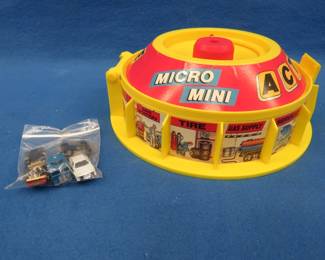 Lot 233. Micro-Mini Action Garage with 5 vehicles