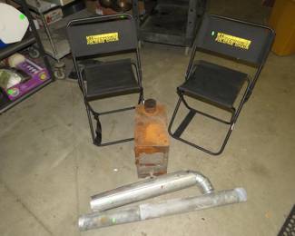 Lot 93. Two folding chairs and a wood stove with piping
