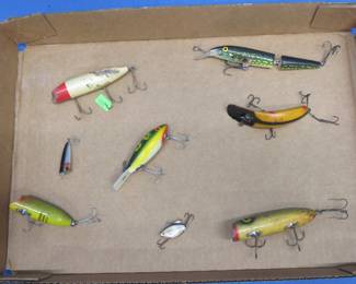 Lot 50. Eight Vintage Lures Including including Heddon Baby Lucky 13, Heddon Sonic, and more