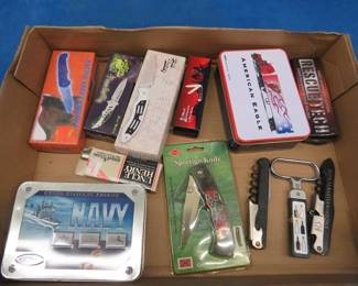 Lot 172. Nine pocket knives including an Uncle Henry, Navy commemorative, American Eagle, Rescue Tech, and mo