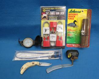Lot 48. Duck Call, Gun Locks, Compass and More