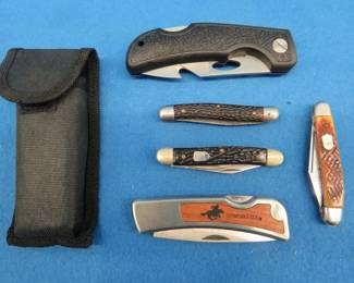 Lot 399. Two locking blade and three pocket knives