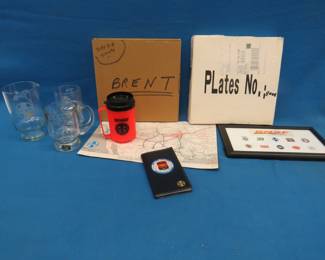 Lot 366. Railroad memorabilia including two plates, glassware, and more