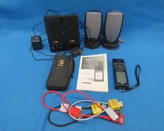 Lot 398. Garmin GPS 12, three gun locks, and two sets of computer speakers