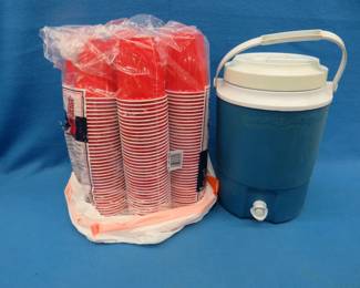 Lot 67. Rubbermaid cooler and 240 red solo cups