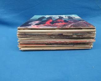 Lot 107. 23 albums of different genres including Linda Ronstadt, Bread, and Dan Fogelberg