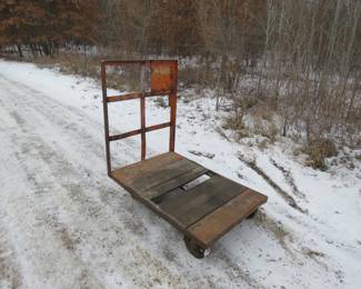Lot 255. Steel wheel cart.&nbsp; Base is 32" x 48".&nbsp; Handle height 49".