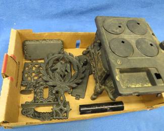 Lot 378. Miniature cast iron stove