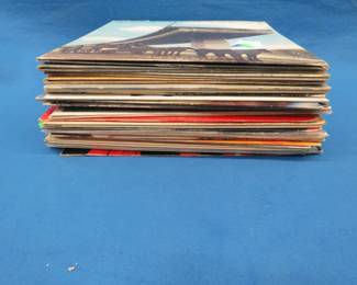 Lot 108. 25 albums of different genres including Doobie Brothers, Joe Cocker, and Jackson Browne.