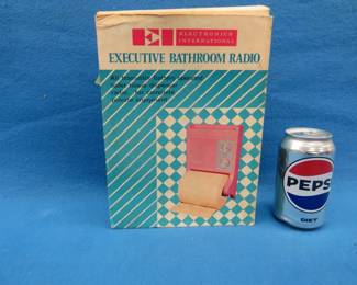 Lot 235. For that person who has everything.&nbsp; Transistor radio/bathroom tissue paper roller.&nbsp; Untested.