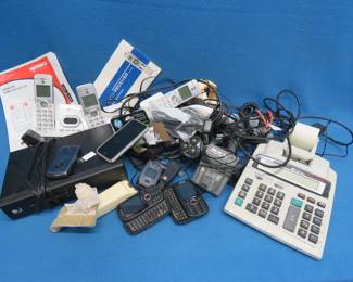 Lot 283. Cordless Phones, DTV Receiver, Casio Calculator, Cordless Shavers, iPhone 5C, and More