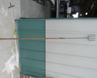 Lot 249. 7' 4" four tine fishing spear