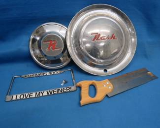 Lot 191. AMC Rambler Hubcap, Nash Hubcap, Hand Saw, and License Plate Surround