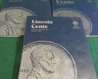 Lot 403. Three Lincoln Penny Folders and Pennies Starting in 1975 with mostly high-grade pennies.