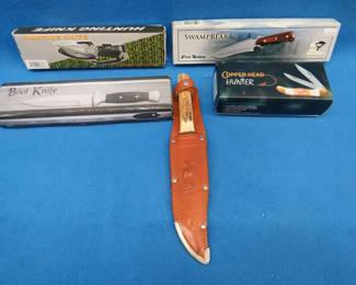Lot 190. Collectible knives including a 445 German Bowie knife, Copper Head, Swamp Bear from Frost Cutlery, a