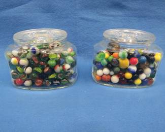 Lot 122. Two glass jars with marbles