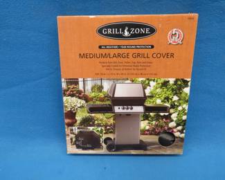 Lot 113. Grill Zone medium/large grill cover.&nbsp; Appears to be new in the box.