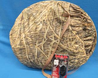 Lot 115. Mossy Oak pop-up blind and a push-button turkey call
