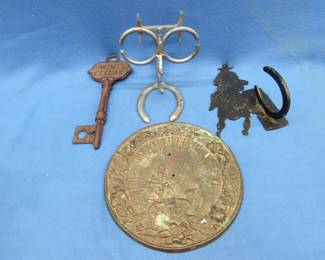 Lot 351. Metal artwork including a nearly 9-lb. brass sundial base