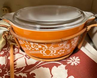 Orange Dynasty Pyrex in Bamboo holder 
