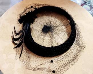 Antique net hats available- hanging on wall in bags