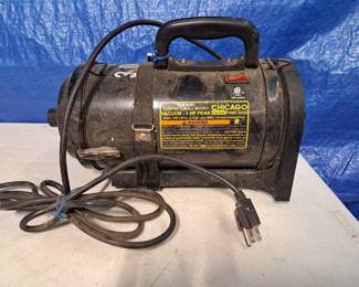 compact, wall mount vacuum