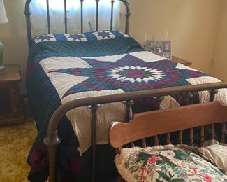 . . . great antique metal bed w/quilt