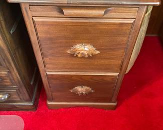 . . . a nice two drawer wood file cabinet