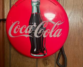 . . . a classic button-style Coke phone