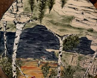 Large ceramic charger over a foot across