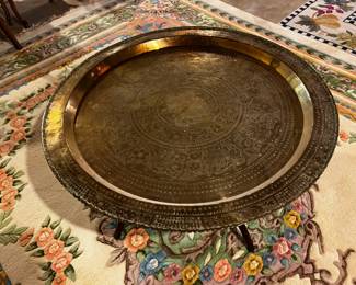 large brass Asian table. 