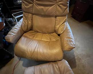 Tan recliner. Two separate reclining leather chairs with ottomans. Purchased at Avanti Furniture in Frankfort for $2500 each. 