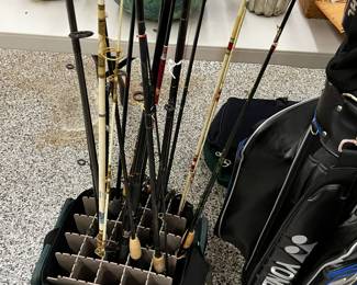 fishing poles, tackle bag and reels. 