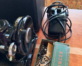 	#59	Singer 221 serial #AL727600 with accessories	 $350.00 				