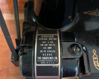 	#59	Singer 221 serial #AL727600 with accessories	 $350.00 				