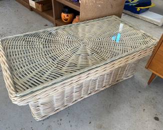 	#102	Wicker coffee table with glass top 43x24x16	 $40.00 				