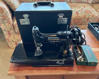 	#59	Singer 221 serial #AL727600 with accessories	 $350.00 				