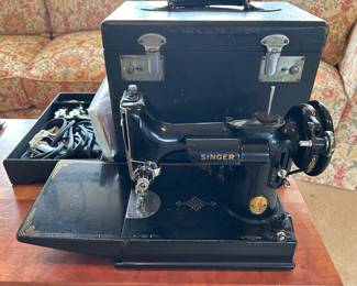 *	#60	Singer 221-1 with accessories	 $450.00 				