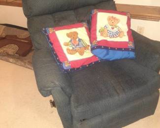 Dark blue recliner with 2 pillows. Bring Help it's located in basement
