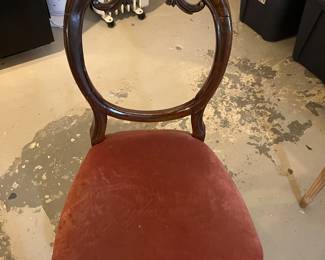 One of several chairs priced to sell during in person shopping only
