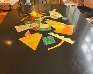 $1200. Hand-painted by artist Odile Buchanan.  52"w x 45.5"d x 30.5"h.  Hand-painted letters on the apron of the table say "We always drink vodka in the morning".