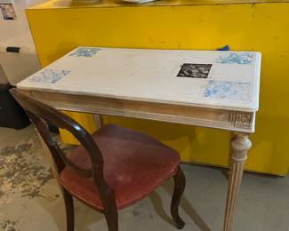 $20. Cute little partially painted table with carved detailing.  36"w x 20"d x 30"h