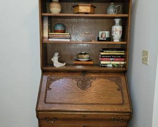 Antique drop down cabinet