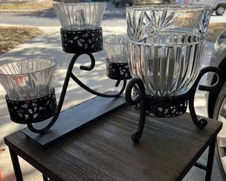 Small table in picture is gone. Also the single glass candle holder